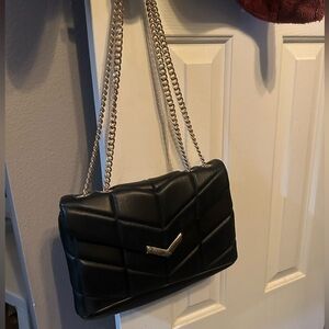 Black quilted hand bag